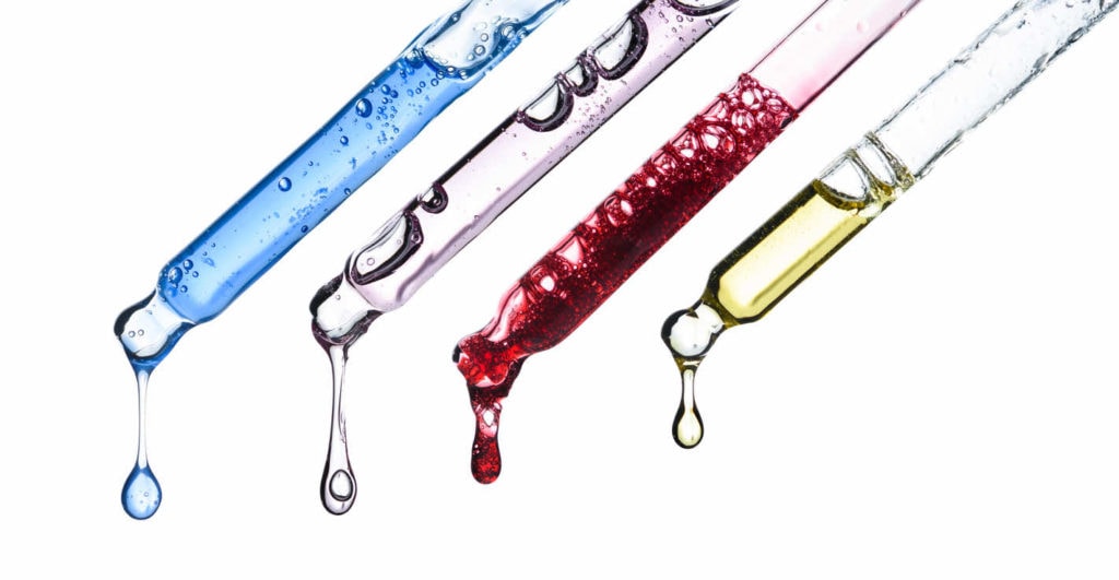 Four droppers containing micronutrients in skin serums