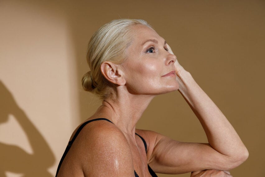 Mature female with beautiful skin after natural looking wrinkle removal treatment